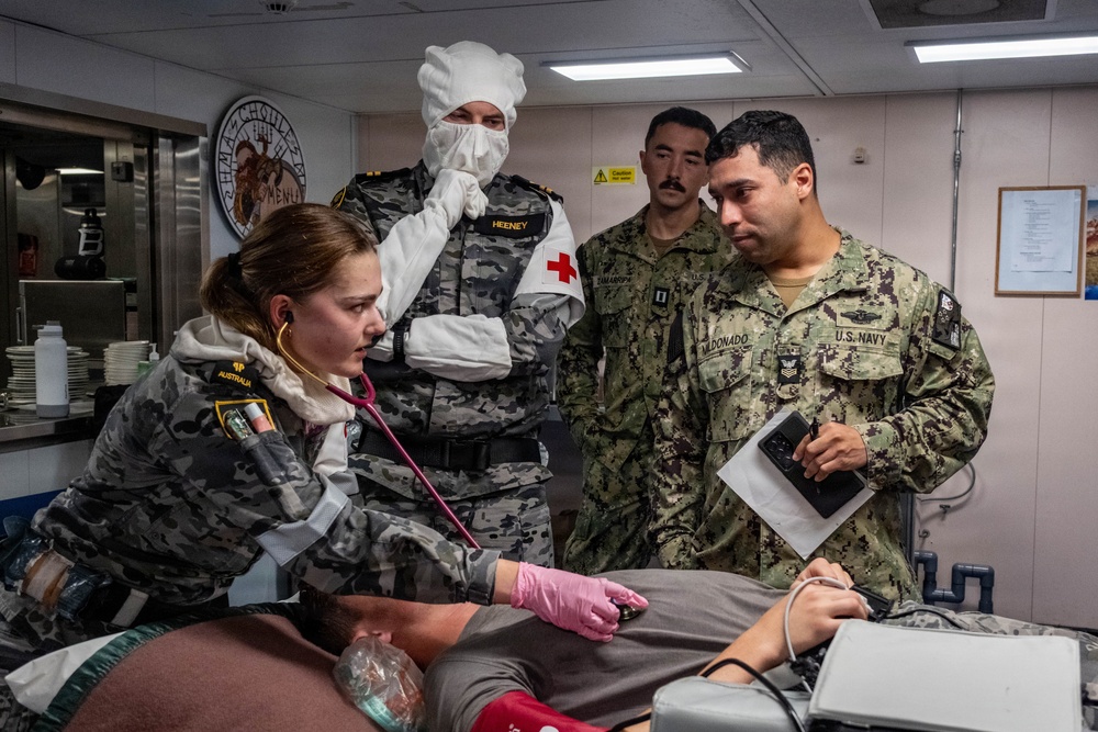 Pacific Partnership 2026 medical team responds alongside Royal Australian Navy HMAS Choules (L100) during damage control drill