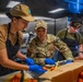 U.S. Navy culinary specialist works in galley aboard Royal Australian Navy HMAS Choules (L100) during Pacific Partnership 2026
U.S. Navy culinary specialist works in galley aboard Royal Australian Navy HMAS Choules (L100) during Pacific Partnership 2026