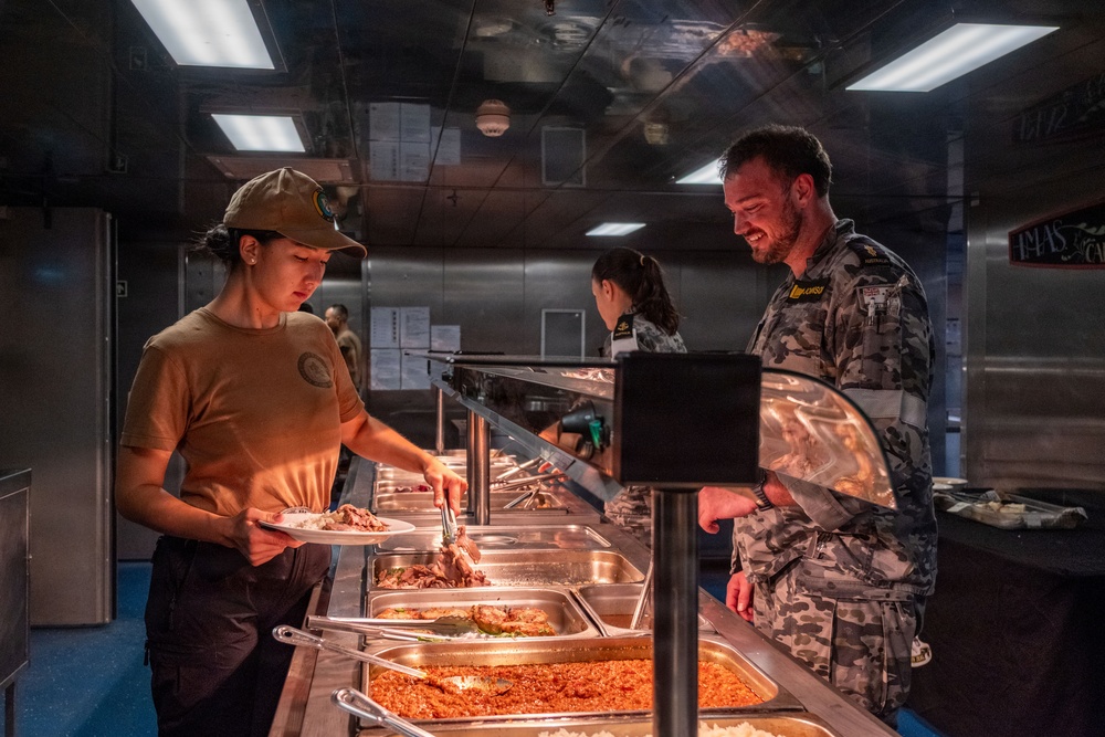 U.S. Navy culinary specialist works in galley aboard Royal Australian Navy HMAS Choules (L100) during Pacific Partnership 2026
U.S. Navy culinary specialist works in galley aboard Royal Australian Navy HMAS Choules (L100) during Pacific Partnership 2026