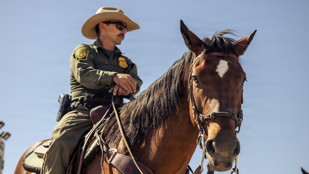 JTF-SB Marines and U.S. Border Patrol saddle-up during interagency training