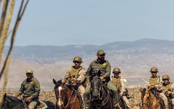 JTF-SB Marines and U.S. Border Patrol saddle-up during interagency training