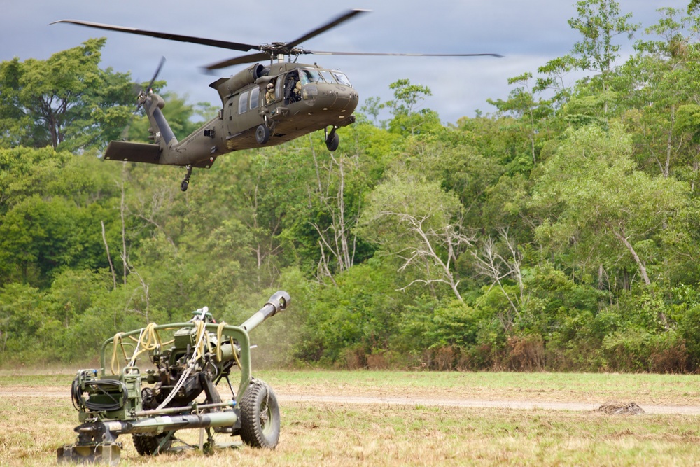 Field Artillery prepares and executes sling load procedures with U.S. Army Assault Battalion
