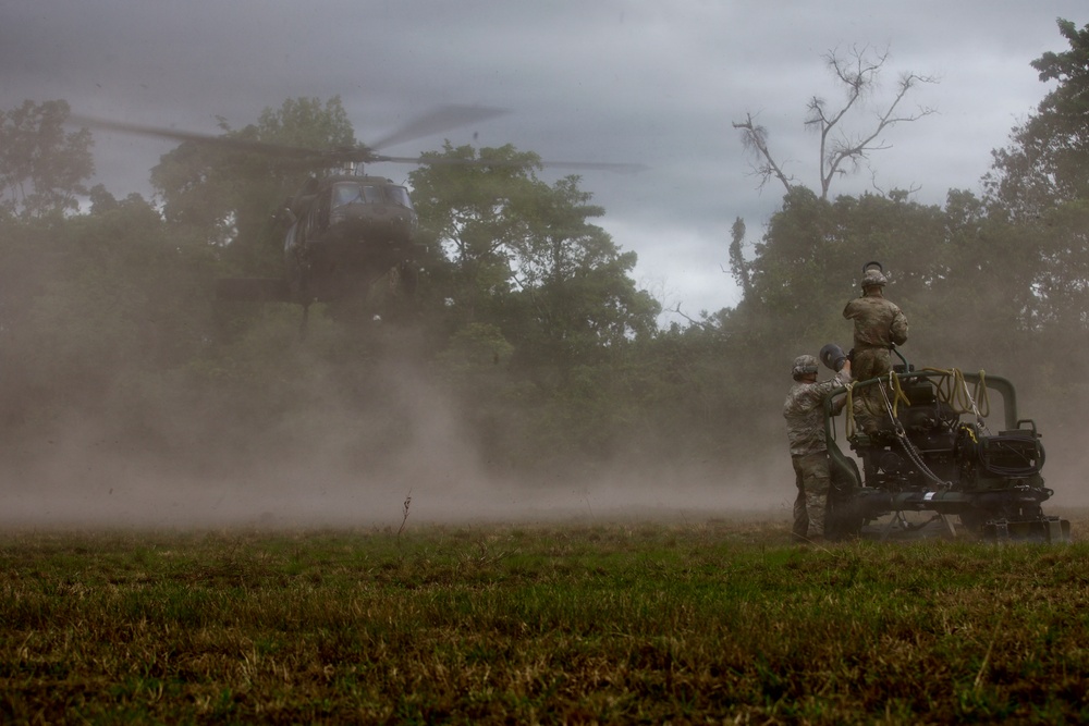 Field Artillery prepares and executes sling load procedures with U.S. Army Assault Battalion