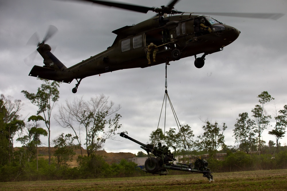 Field Artillery prepares and executes sling load procedures with U.S. Army Assault Battalion