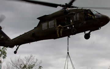 Field Artillery prepares and executes sling load procedures with U.S. Army Assault Battalion
