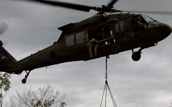 Field Artillery prepares and executes sling load procedures with U.S. Army Assault Battalion