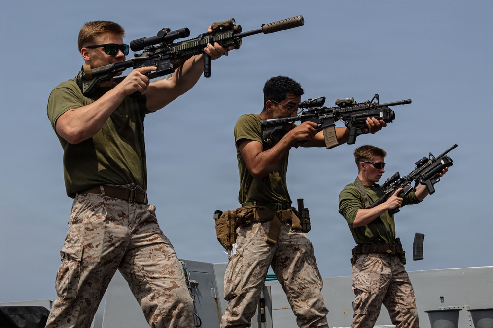 U.S. Marines conduct marksmanship training aboard USS Portland