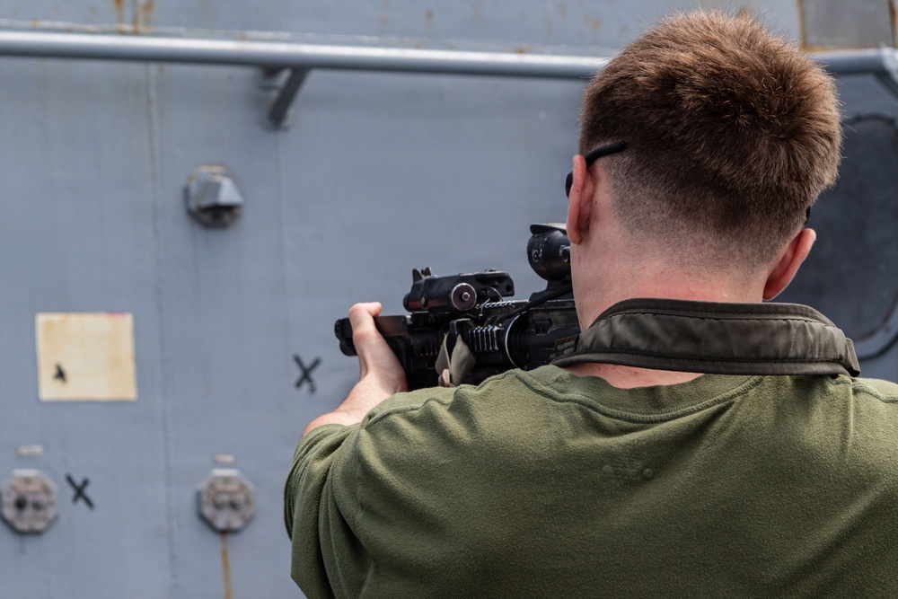 U.S. Marines conduct marksmanship training aboard USS Portland