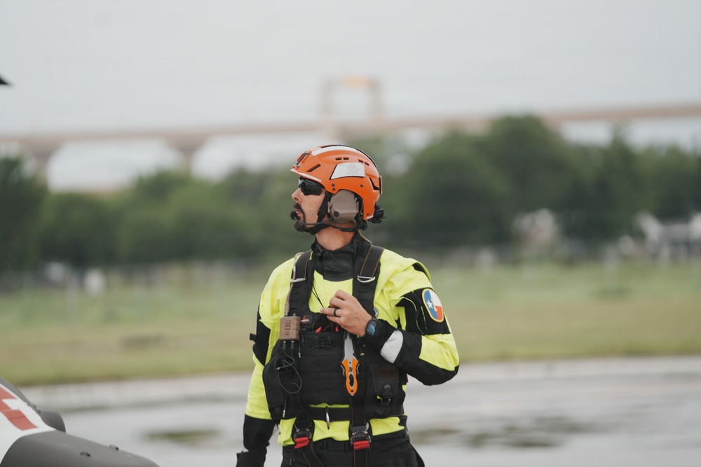 Texas National Guard Aircrew Member Observes Flight Operations