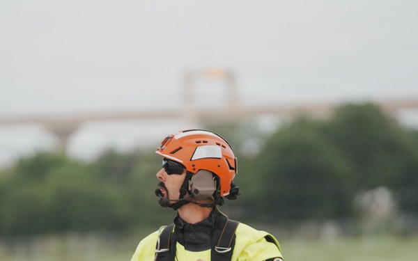 Texas National Guard Aircrew Member Observes Flight Operations