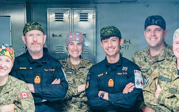 Canadian Forward Surgical Team pose for a photo aboard USS Essex during RIMPAC 2026