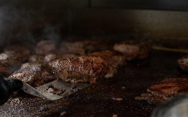 USCGC Eagle culinary specialists prepare a meal at sea