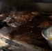 USCGC Eagle culinary specialists prepare a meal at sea
