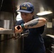 USCGC Eagle culinary specialists prepare a meal at sea
