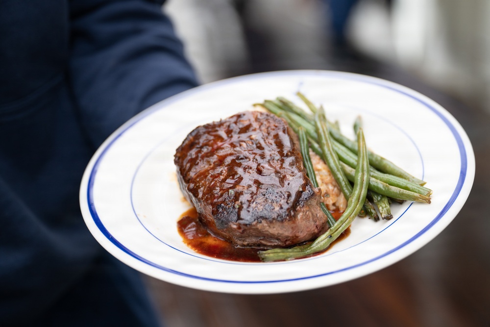 USCGC Eagle culinary specialists prepare a meal at sea