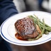 USCGC Eagle culinary specialists prepare a meal at sea