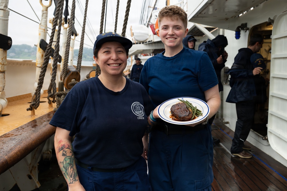 USCGC Eagle culinary specialists prepare a meal at sea