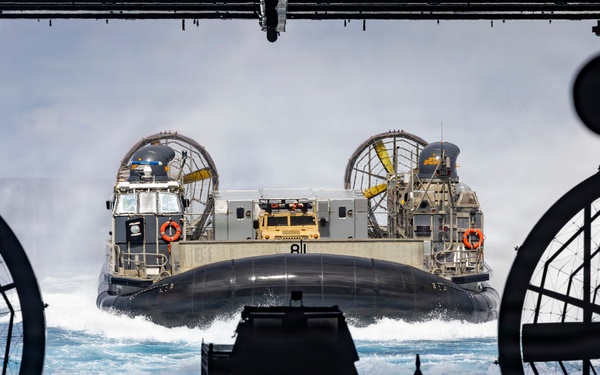 USS Essex conducts instream onload