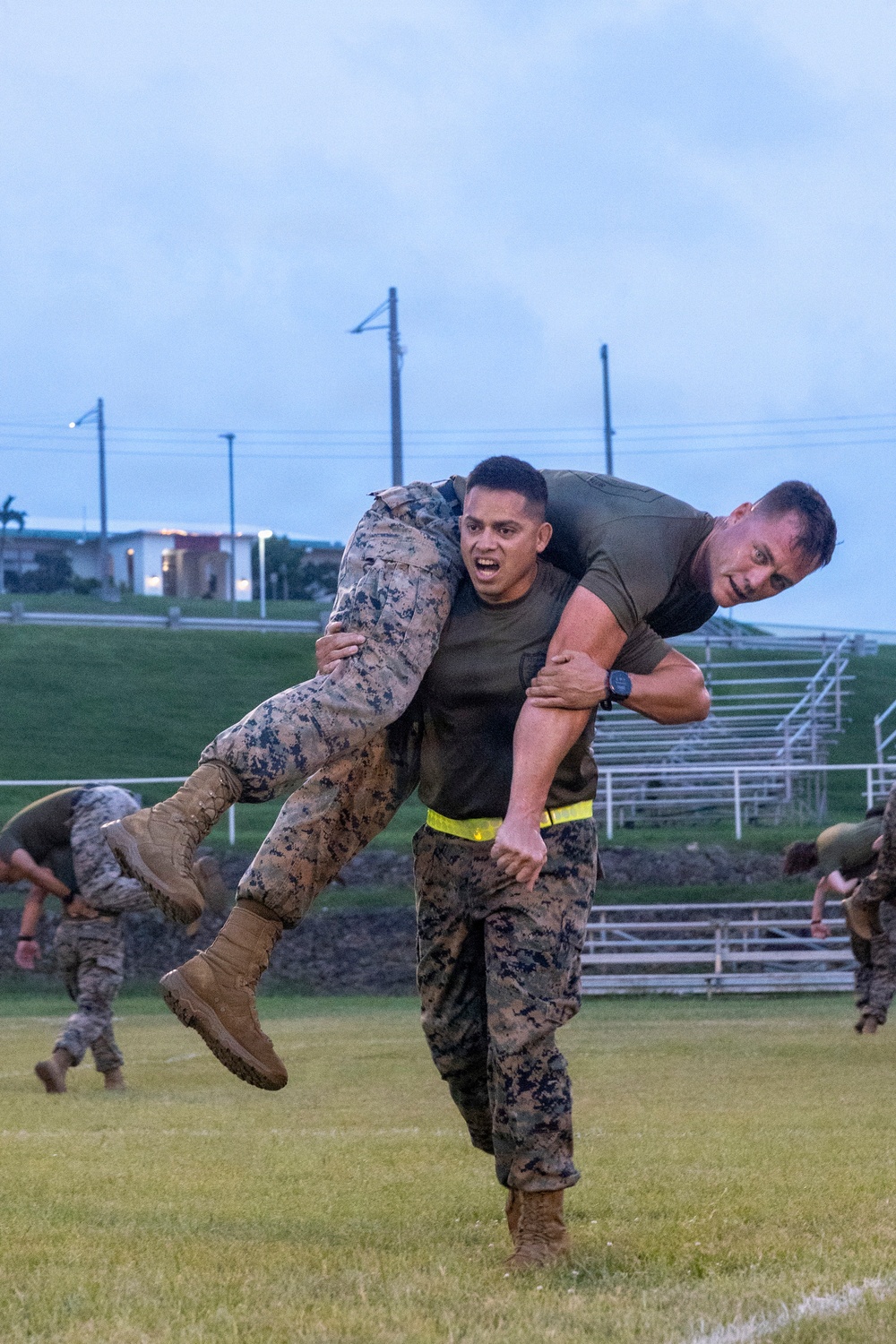 U.S. Marine with 3rd Marine Division conduct a Staff NCO and Officer Physical Training Event