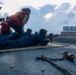 USS Tripoli Conducts Early Morning Gun Shoot