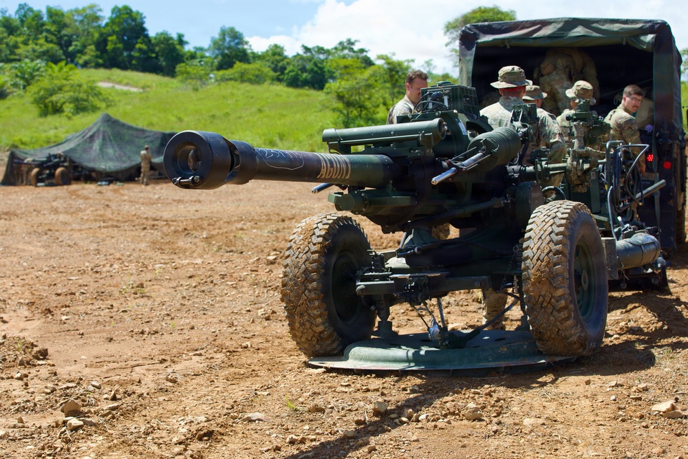 Keris Strike 26: Oklahoma Army National Guard prepare M119A3 howitzer during field artillery exercise with Malaysian army