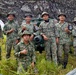 Keris Strike 26: Malaysian Army soldiers pose with artillery piece