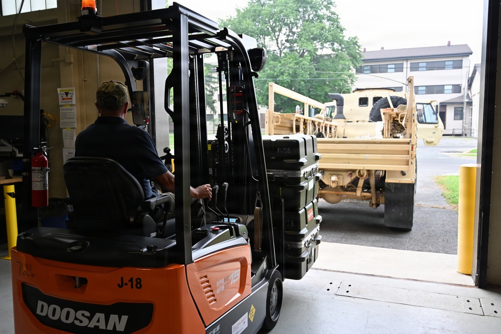 Training Support Center Forklift Loads Javelin Systems at JB MDL