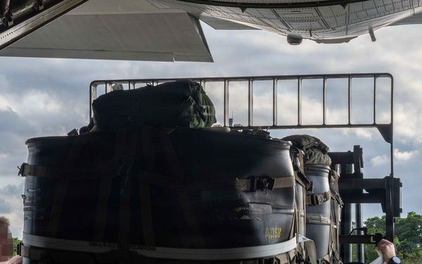 AFSOC MC-130J conducts nighttime air drops