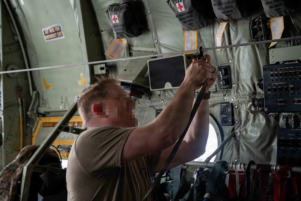 AFSOC MC-130J conducts nighttime air drops