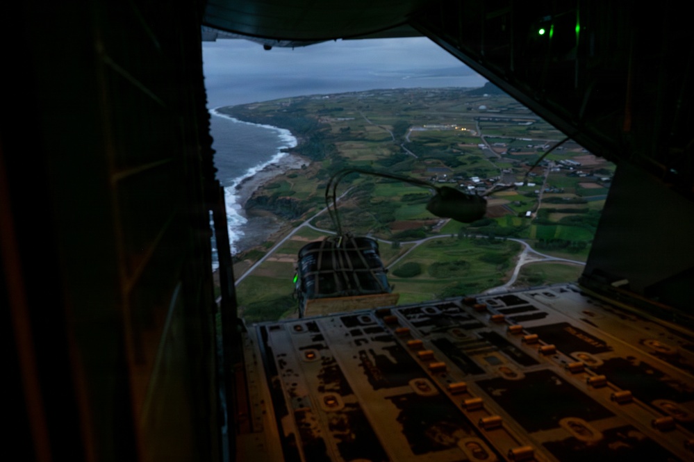 AFSOC MC-130J conducts nighttime air drops