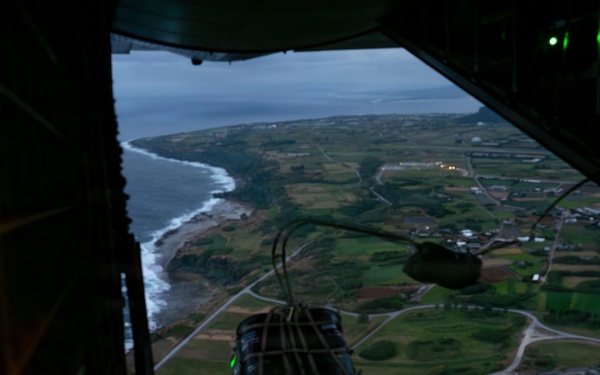 AFSOC MC-130J conducts nighttime air drops