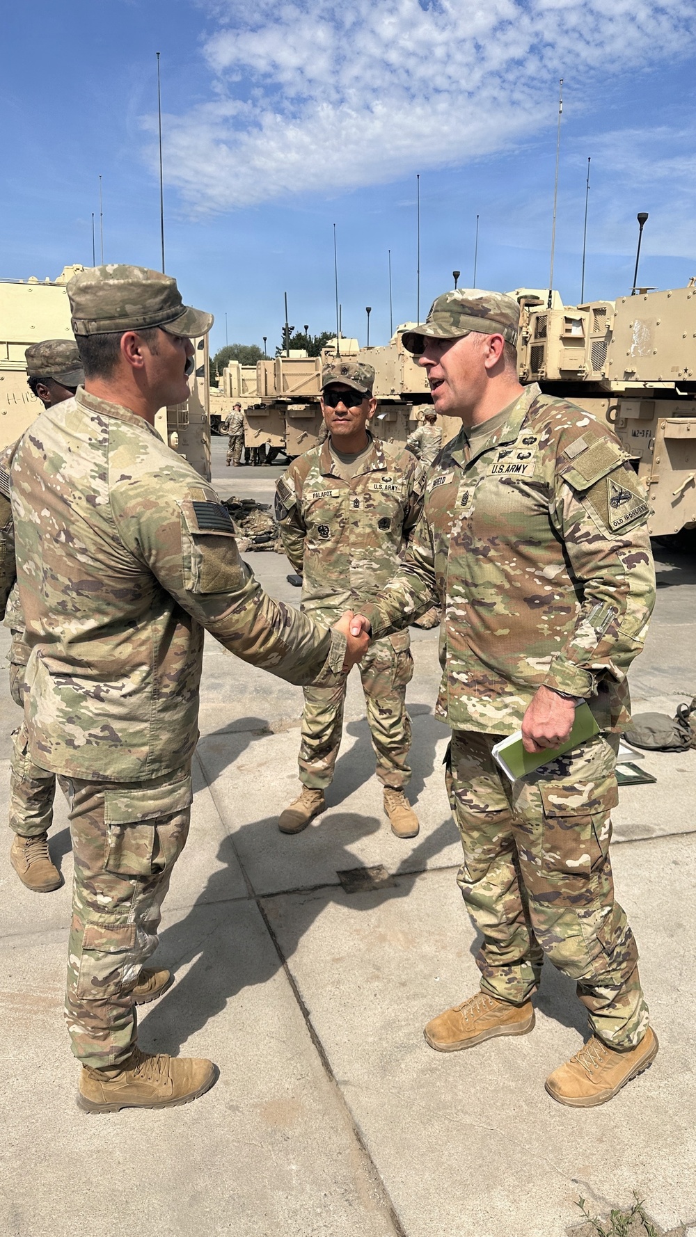 Gunner NCOs receive RFCT coins from CSM Jeremiah A. Enfield on behalf of Col. Richard A. Montcalm