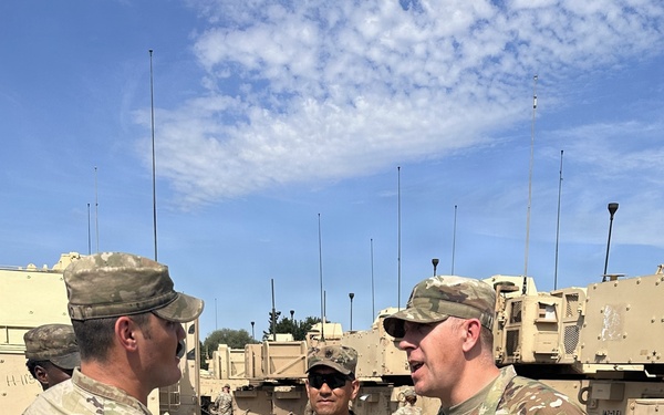 Gunner NCOs receive RFCT coins from CSM Jeremiah A. Enfield on behalf of Col. Richard A. Montcalm