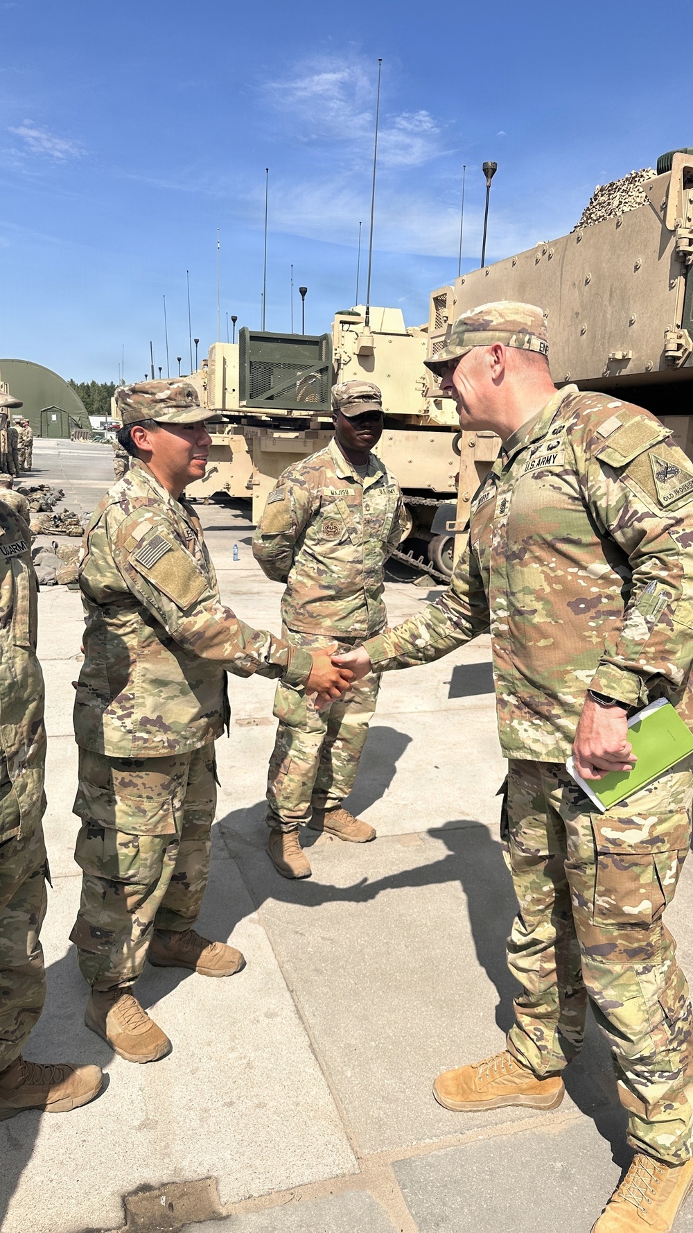 Gunner NCOs receive RFCT coins from CSM Jeremiah A. Enfield on behalf of Col. Richard A. Montcalm