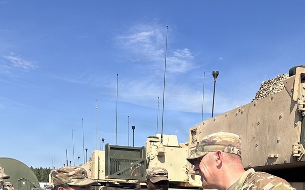 Gunner NCOs receive RFCT coins from CSM Jeremiah A. Enfield on behalf of Col. Richard A. Montcalm