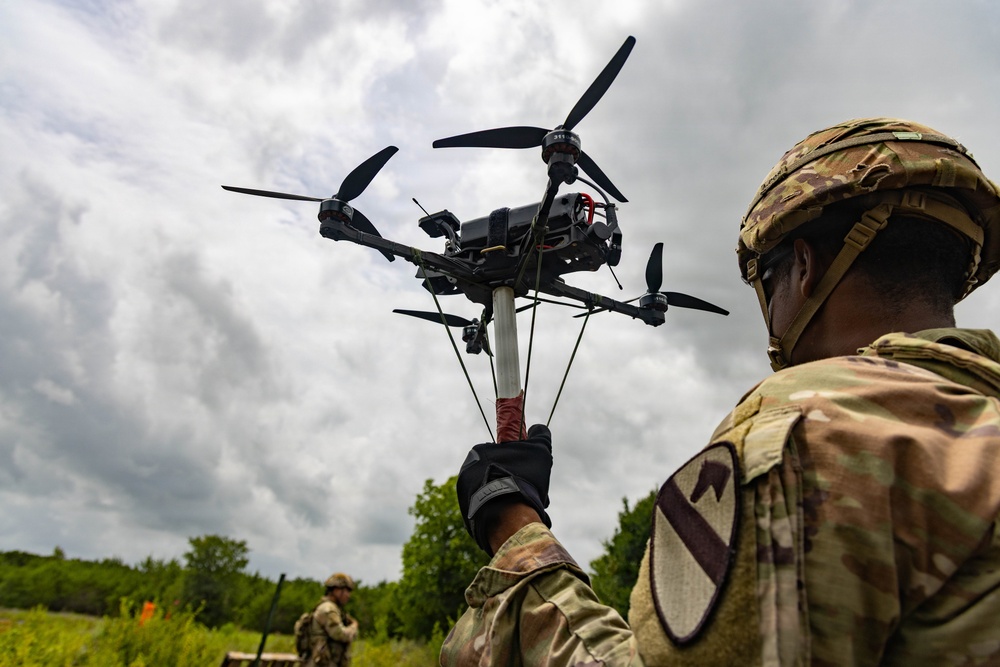 1st Cavalry Division Troopers refine counter-drone tactics during qualification