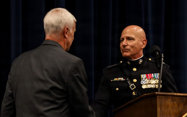 Lt. Gen. Matos hosts U.S. Rep Steve Womack at an indoor Evening Parade