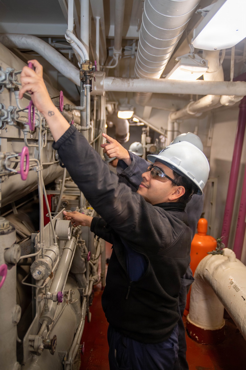 Ronald Reagan Sailors Conduct Air Conditioning Maintenance