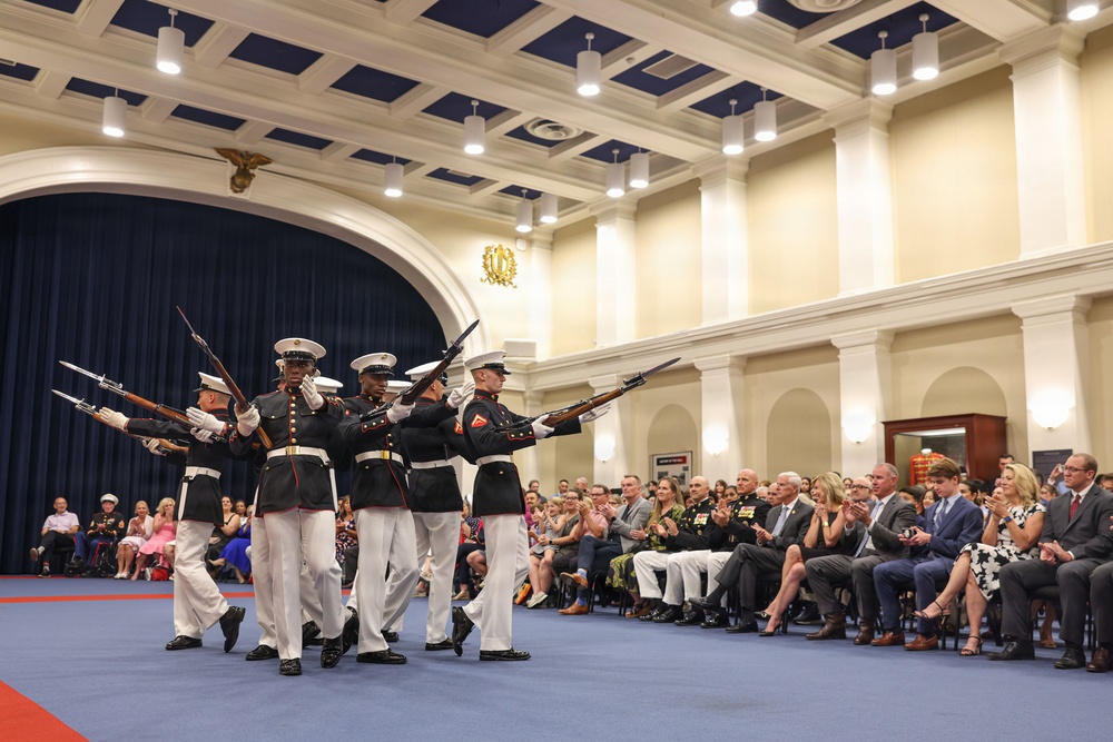 Lt. Gen. Matos hosts U.S. Rep Steve Womack at an indoor Evening Parade