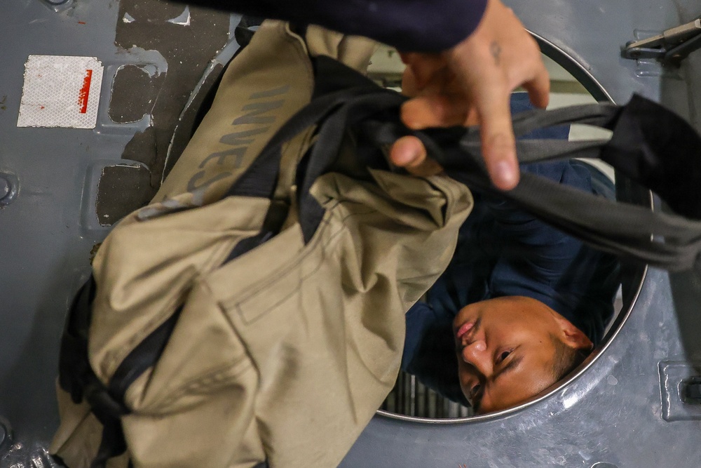 Sailors simulate general quarters aboard USS Decatur during RIMPAC