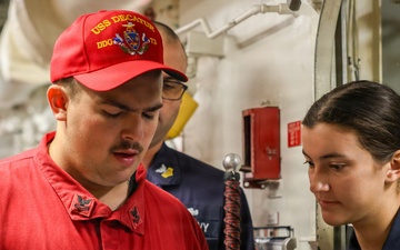 Sailors simulate general quarters aboard USS Decatur during RIMPAC