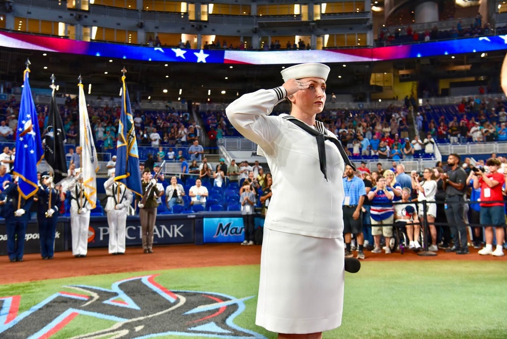 Navy Band Southeast performs in the America 250 Celebration/Military Appreciation Game at LoanDepot Stadium in Miami, Florida.