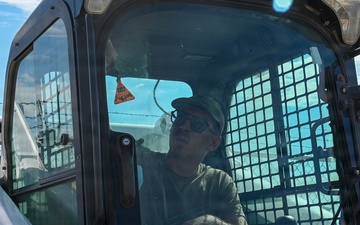 Twenty five feet from disaster; Gunfighter Airmen save home from wildfire