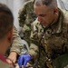 Global Medic Personnel Treat Simulated Casualty