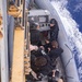 HMCS Regina conducts passenger transfer at sea with HMNZS Te Mana