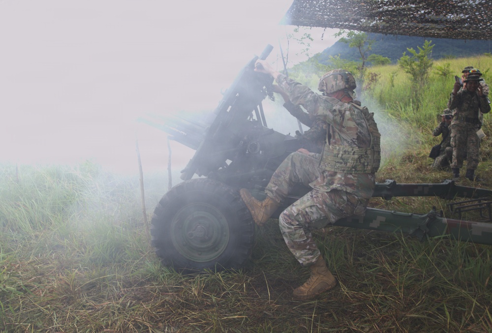 Guam National Guard and Malaysian Army artillery live fire
