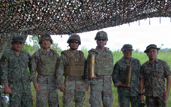 Guam National Guard and Malaysian Army artillery live fire