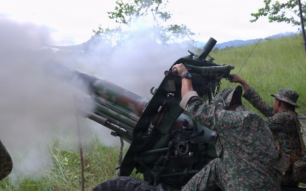 Guam National Guard and Malaysian Army artillery live fire