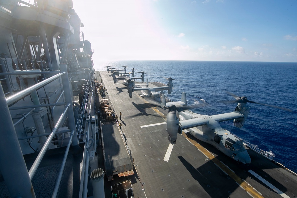 USS Tripoli Conducts MV-22 Osprey Fly-Over