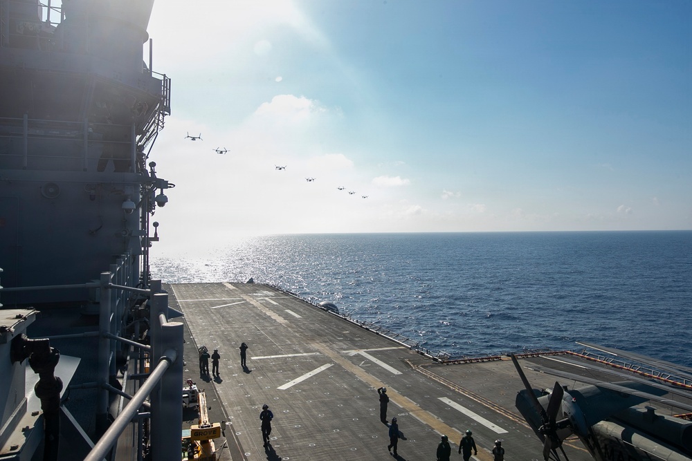 USS Tripoli Conducts MV-22 Osprey Fly-Over